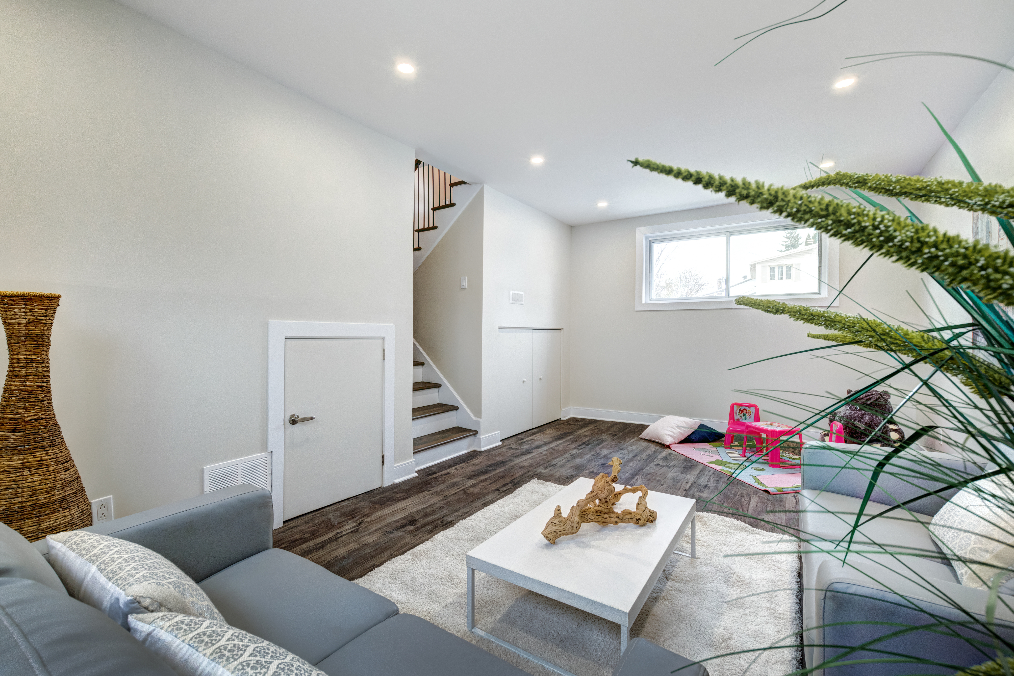 Clean finished basement living space.