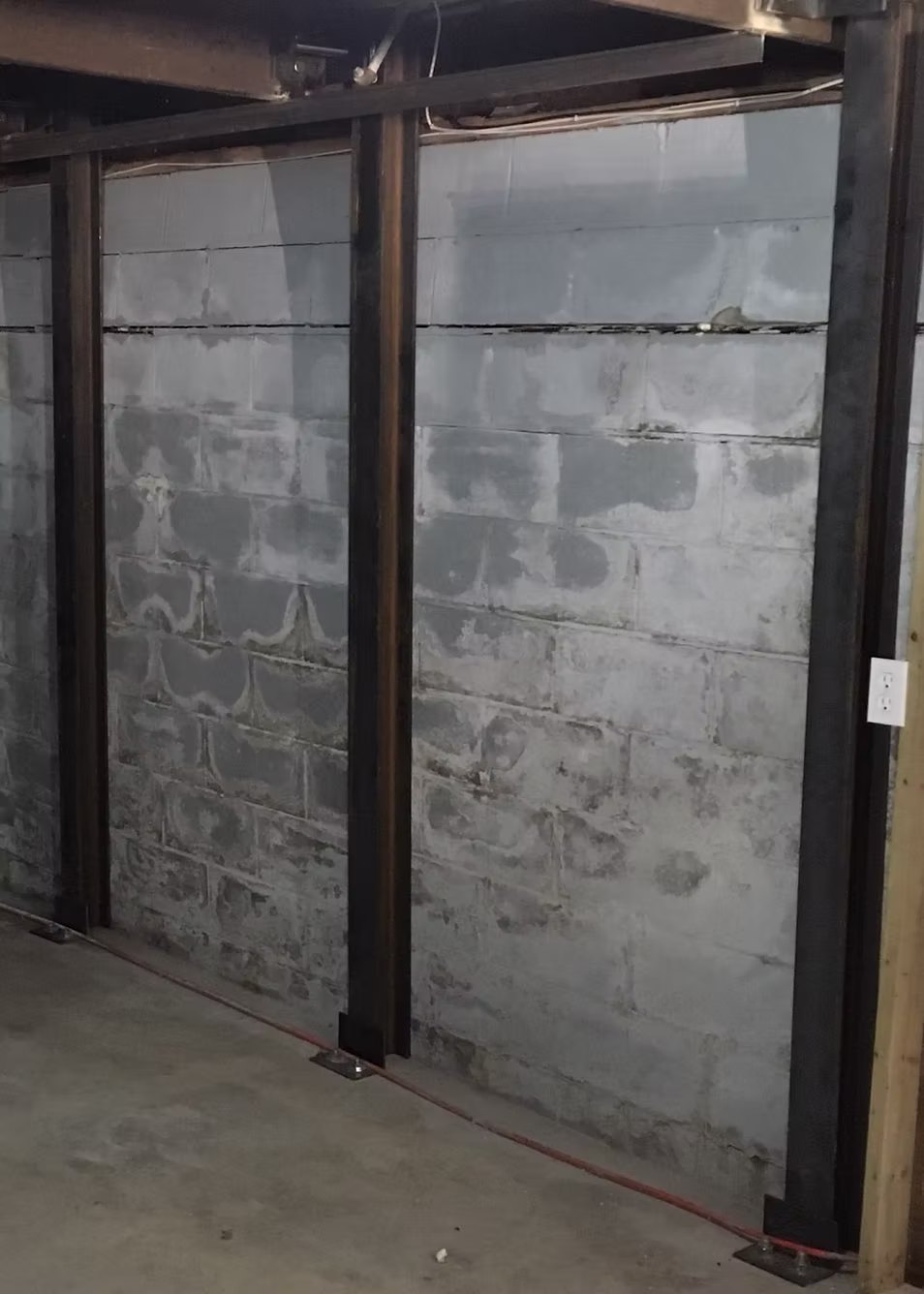 Finished basement staircase and living space.