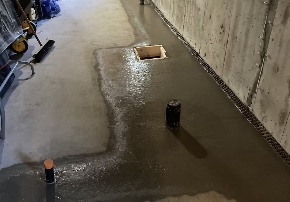 Interior waterproofing drainage installation.